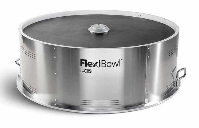 Schneider & Company - A shiny, circular FlexiBowl industrial parts feeder on a white background, likely used for automated assembly or packaging processes.