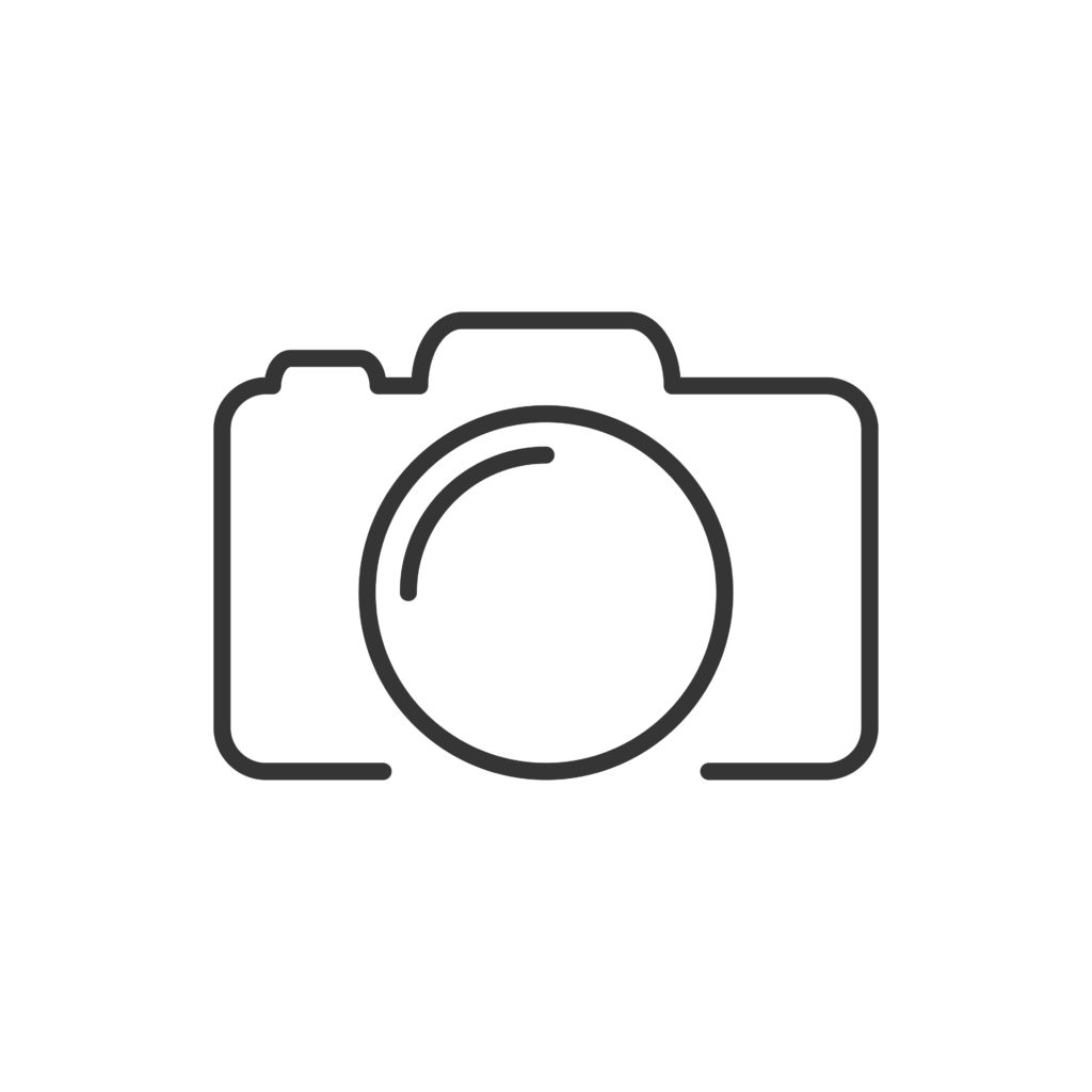 a black-and-white outline of a camera on a white background